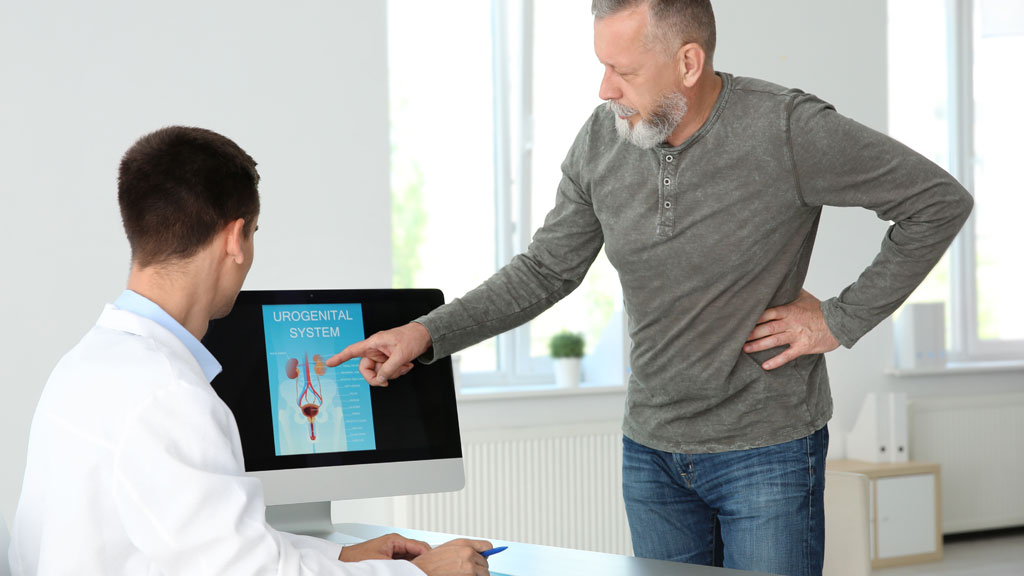 Senior couple walking through park setting discussing urinary health and probiotics
